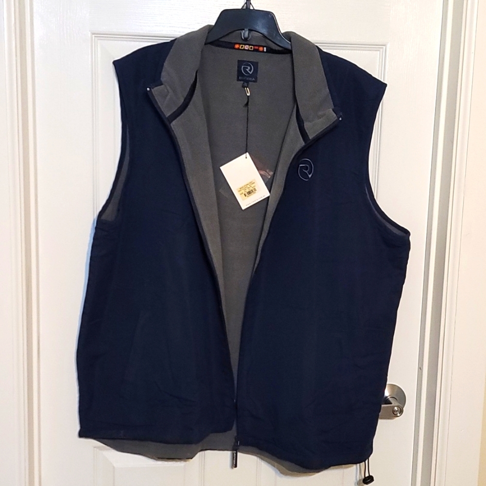 Mens 2x storm vest by Riviera. New w/ tag. 100% Polyester. Measurements in photo